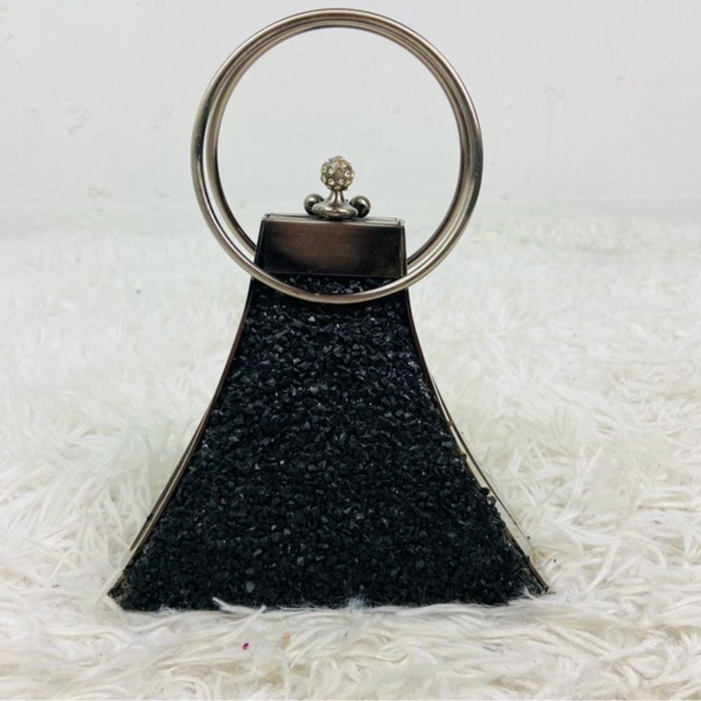 GEM black & silver specled rock circular clasped hand healed party bag
